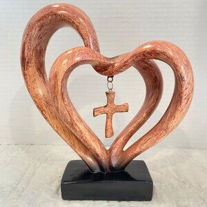 Heart-Shaped Wooden Sculpture With Hanging Cross On Black Base